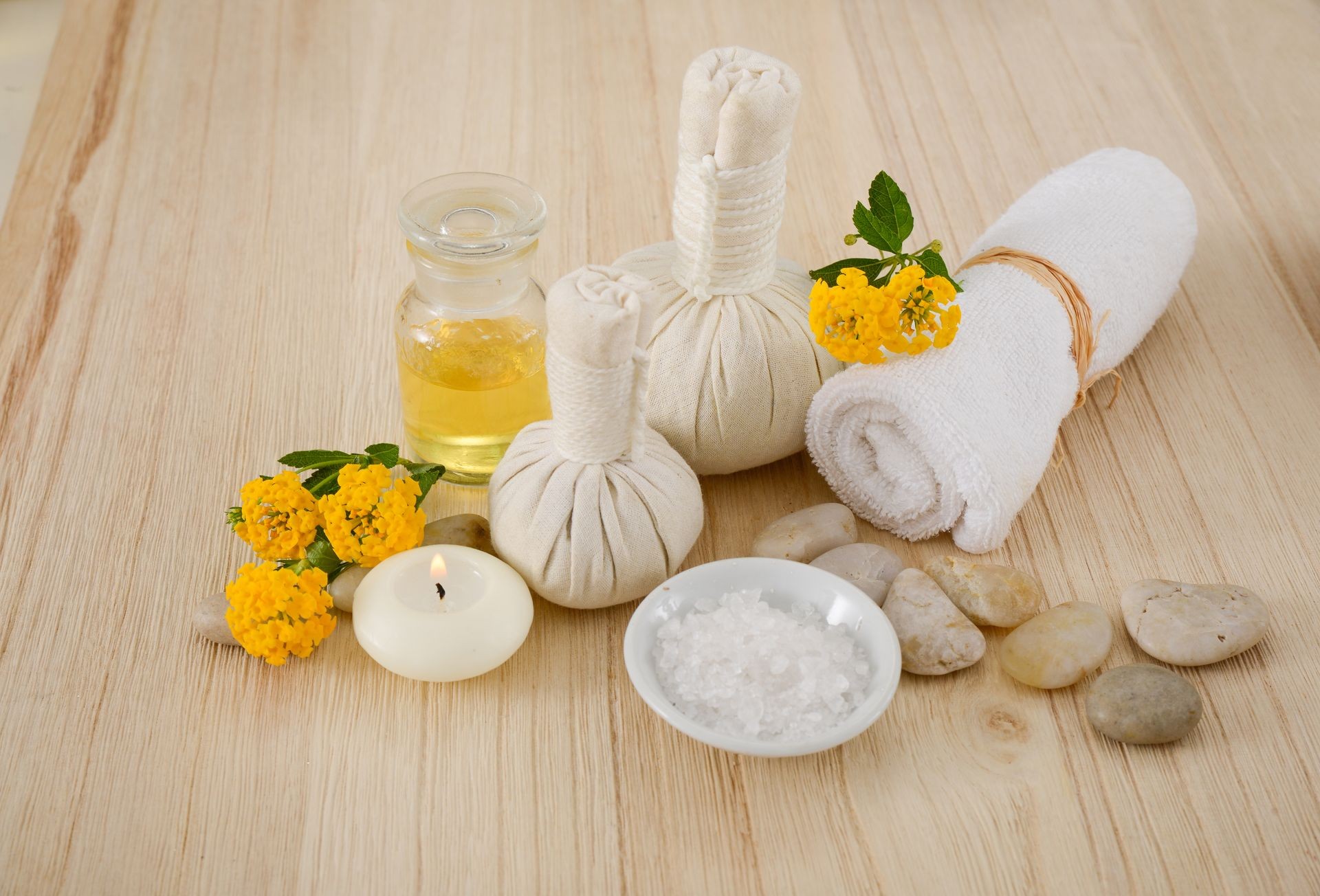 Composition of tropical spa treatment on wooden board background